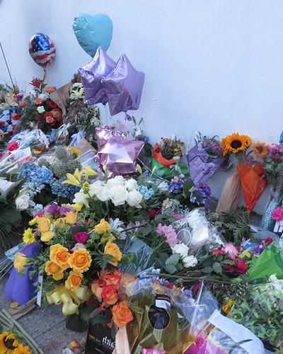 Mourners leave flowers